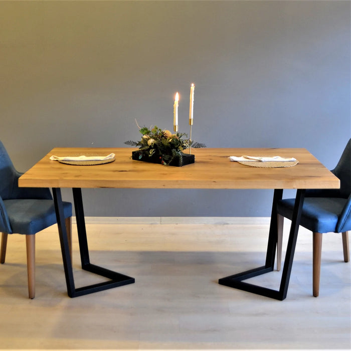Rustic oak dining table frame with a natural wood grain finish and sturdy construction.
