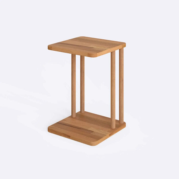 Close-up of the Solid Wood C Table’s craftsmanship – A detailed view showcasing the smooth wood grain and sturdy construction of the C-table.