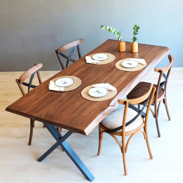 Top view of the Eagan dining table showcasing its smooth pine wood surface and sturdy metal legs