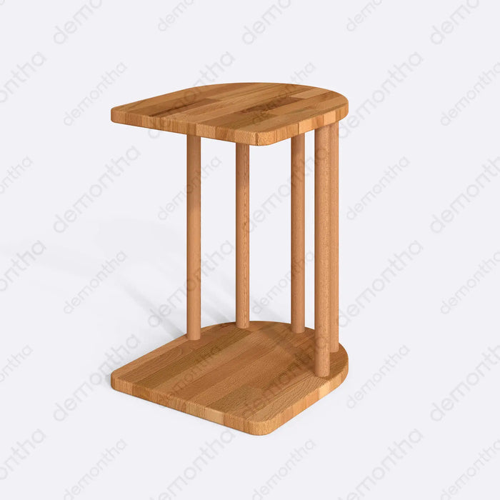 A close-up of the Kyoto C-Shaped Wooden Side Table, showcasing its sturdy construction and smooth wood finish, ideal for placing drinks, books, or a laptop.