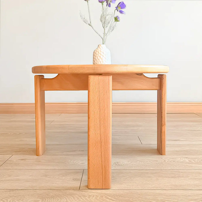 A side view of the table, showcasing its well-proportioned legs and balanced structure.