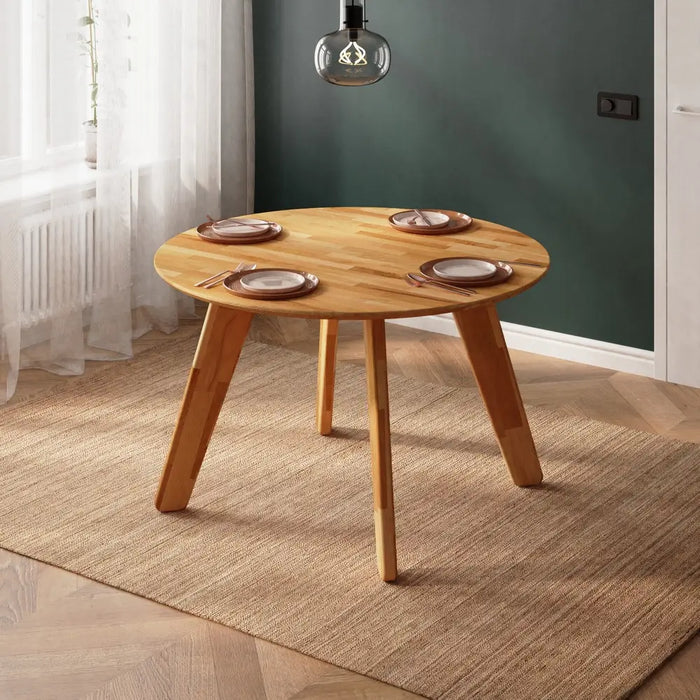 Close-up of the modern leg design, complementing the solid wood tabletop’s aesthetic.