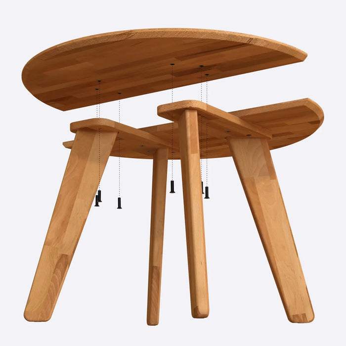 Side profile of the round kitchen table, emphasizing its sturdy construction and sleek modern legs.