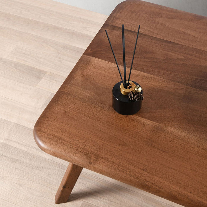 Sidney Rectangular Cocktail Table made of solid walnut wood, featuring a mid-century modern design with clean lines and a rich wood finish upper view with zoomed in lense