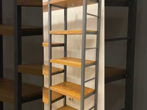 A 360-degree video of the Portland Pine Room Divider Bookcase, highlighting its solid pine wood construction, metal legs, and how it functions as a stylish room divider and organizer.