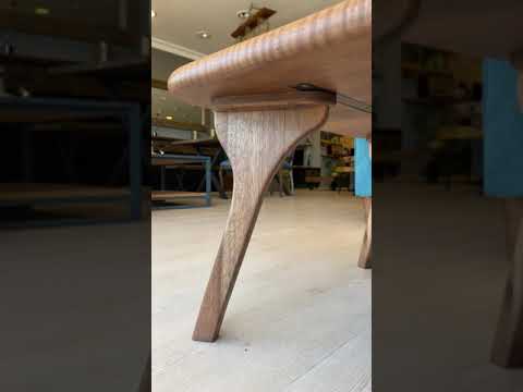 Sidney Rectangular Cocktail Table made of solid walnut wood, featuring a mid-century modern design with clean lines and a rich wood finish video shocasing the product close