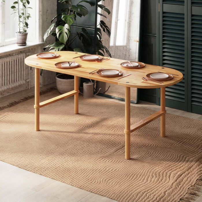 Oval dining table for 6, perfect for modern family gatherings and versatile interior designs