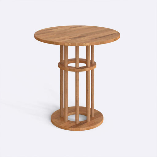 Side view of the Grant Dining Table showcasing the sturdy wood legs and simple round design.