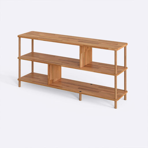 A side perspective highlighting the short and sturdy design of this solid wood bookcase, perfect for small spaces.