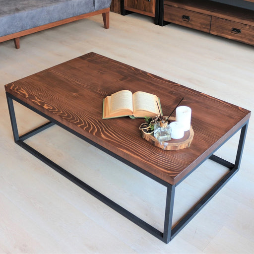 Front view of the Renton Rectangular Coffee Table in solid pine wood, showcasing its spacious tabletop and sturdy rectangular design.