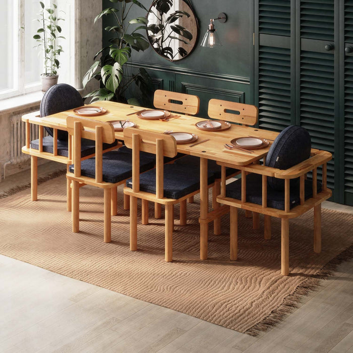 A modern and minimalist rectangular dining table with 6 chairs, set in a well-lit dining room, highlighting the table's sleek and clean lines.