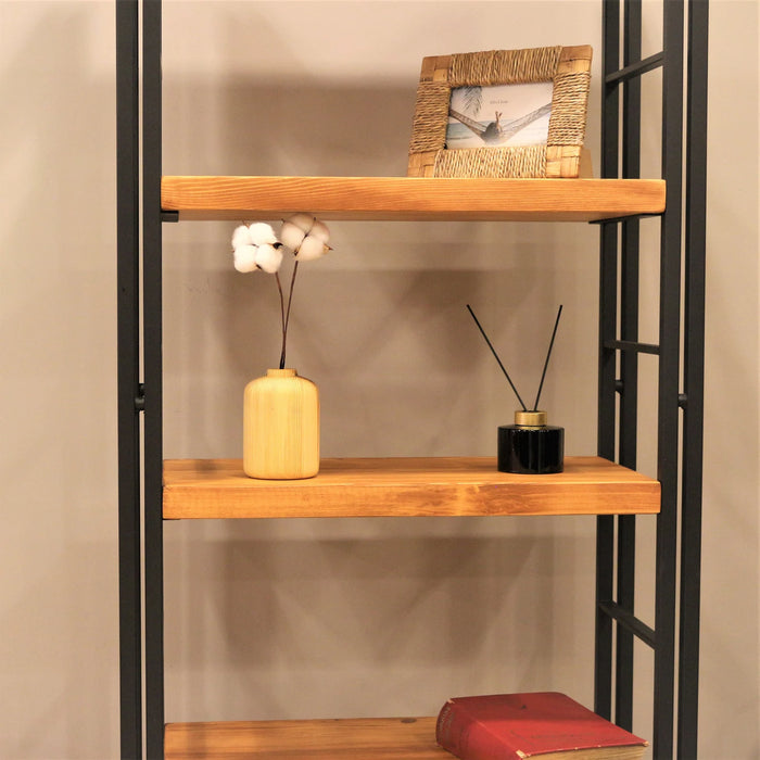 Close-up of the pine wood grain and metal corner design, showcasing the sturdy and rustic craftsmanship of the bookcase.