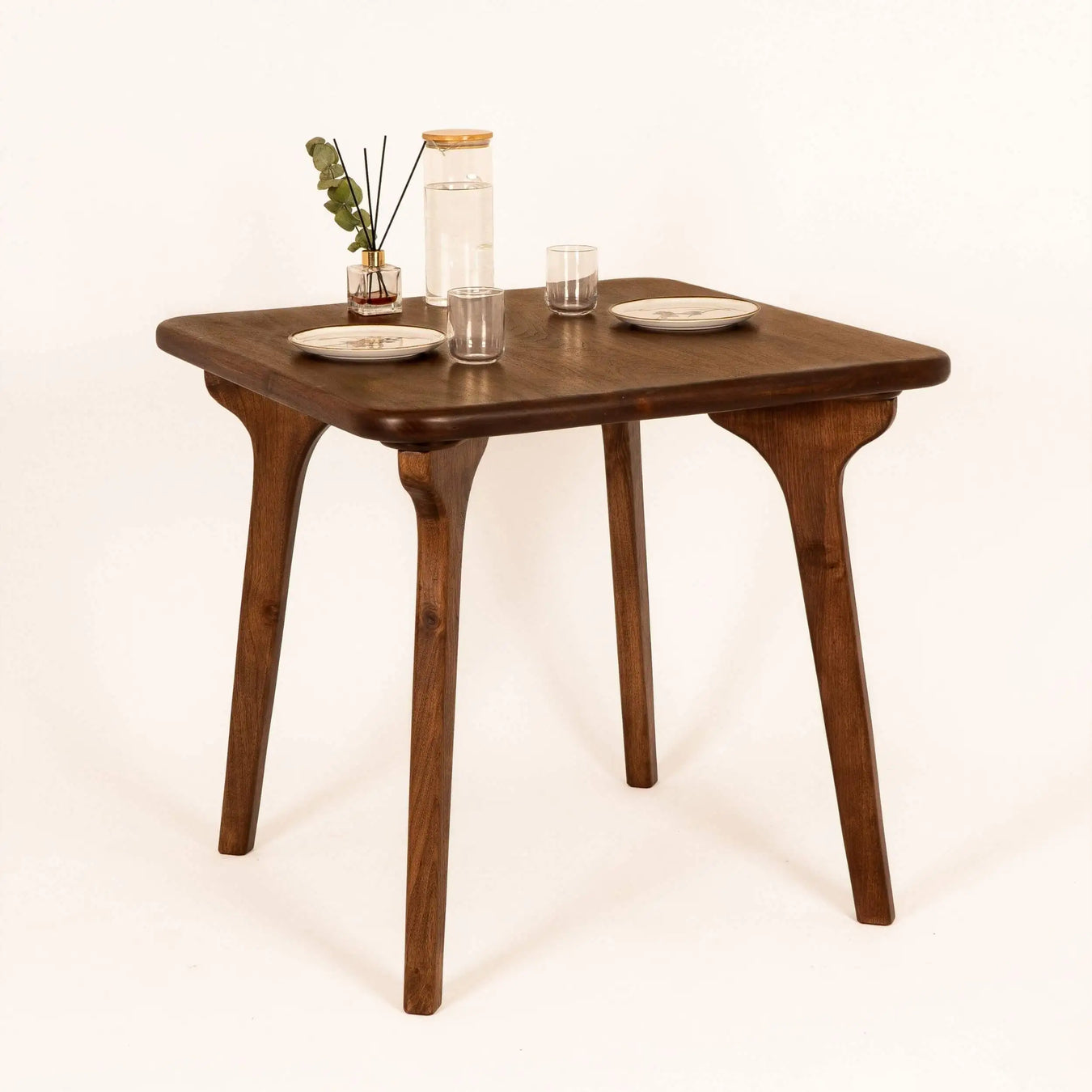 Handcrafted solid wood square dining table with expert craftsmanship using only selected high-quality wood materials