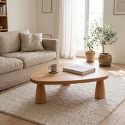 A Sculptural Beech Coffee Table with a Soft Organic Triangle Form