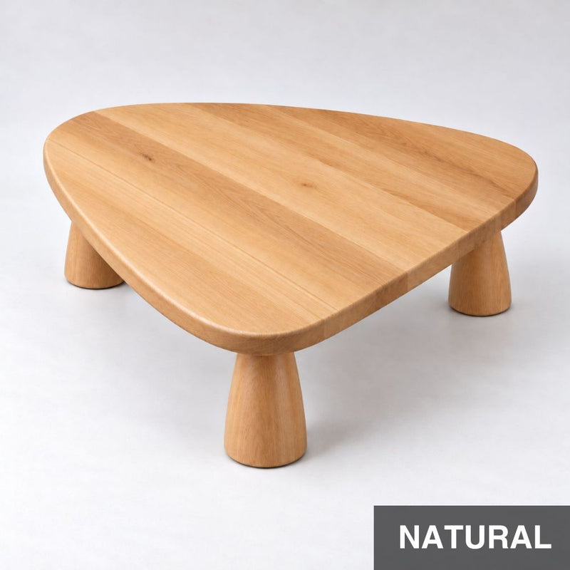 A Sculptural Beech Coffee Table with a Soft Organic Triangle Form