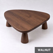 A Sculptural Beech Coffee Table with a Soft Organic Triangle Form