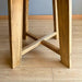 Wide shot of the Amber Round Farmhouse Dining Table in a modern farmhouse dining setting.