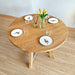 Profile view of Dining Table, showing its clean, minimalist design.