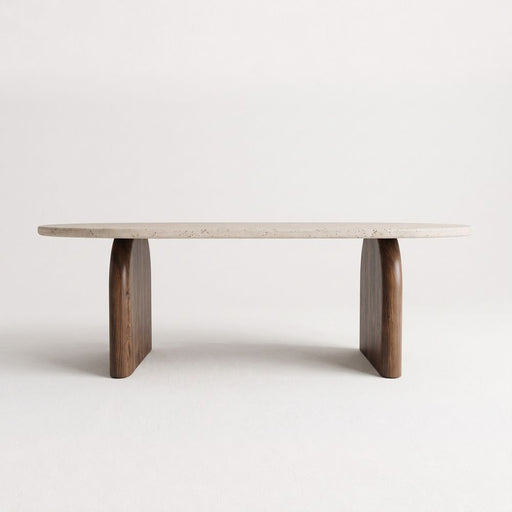 Arden Oval Travertine Coffee Table with Walnut Base - Sculptural Mid-Century Design Straight-On Studio View by Tomruque