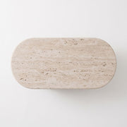 Top View Surface of Arden Oval Travertine Coffee Table with Walnut Base - Sculptural Mid-Century Design by Tomruque