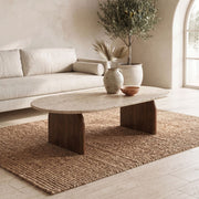 Arden Oval Travertine Coffee Table with Walnut Base - Sculptural Mid-Century Design Styled in a Japandi Living Room by Tomruque