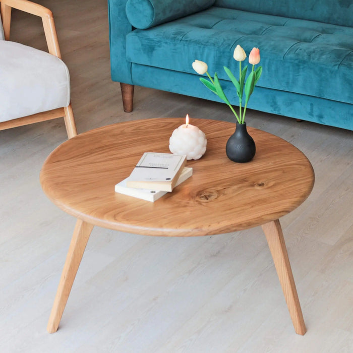 Handcrafted Aura Solid Oak Wood Coffee Table with a round top, showcasing elegant craftsmanship and a timeless mid-century style.