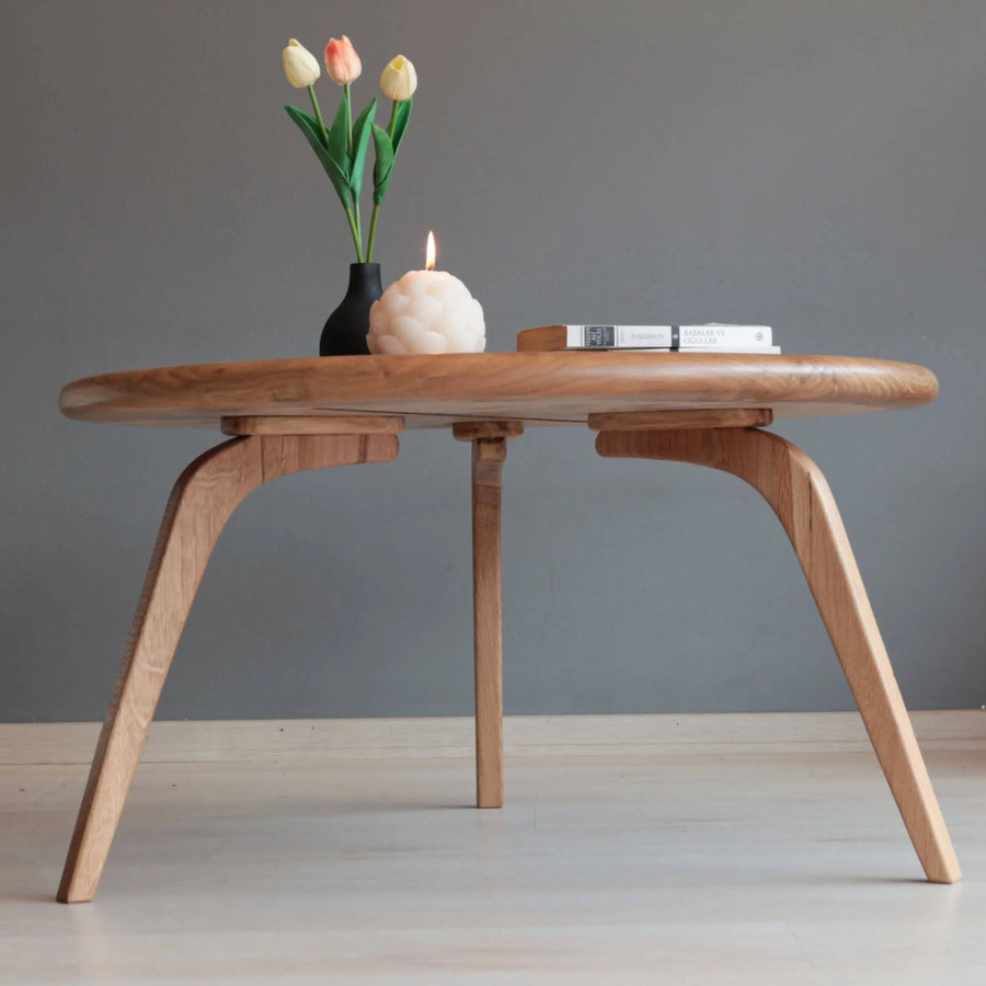 Aura Solid Oak Wood Coffee Table with a smooth surface and round shape, blending modern design with natural oak wood beauty.