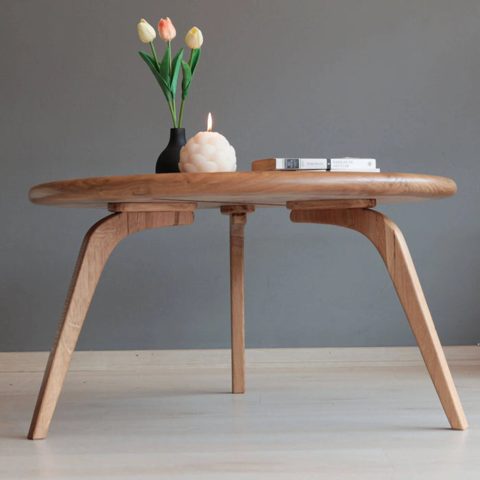 Aura Solid Oak Wood Coffee Table with a smooth surface and round shape, blending modern design with natural oak wood beauty.