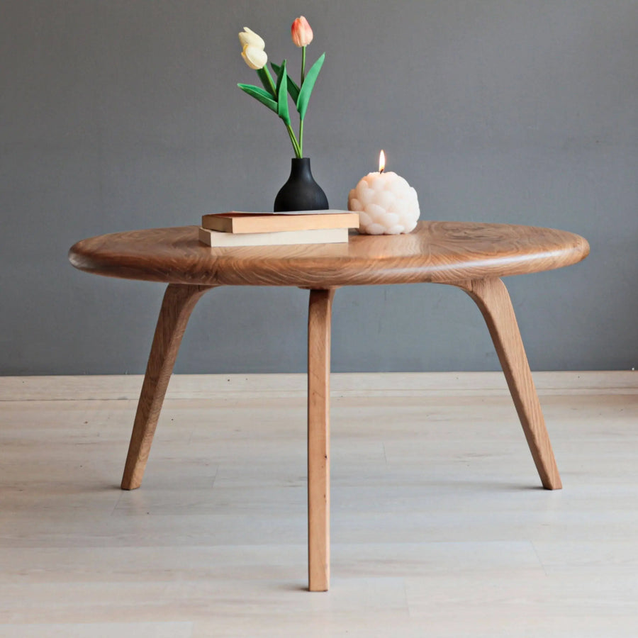 Stylish and durable Aura Solid Oak Wood Coffee Table, featuring a mid-century modern design with tapered legs and natural wood finish