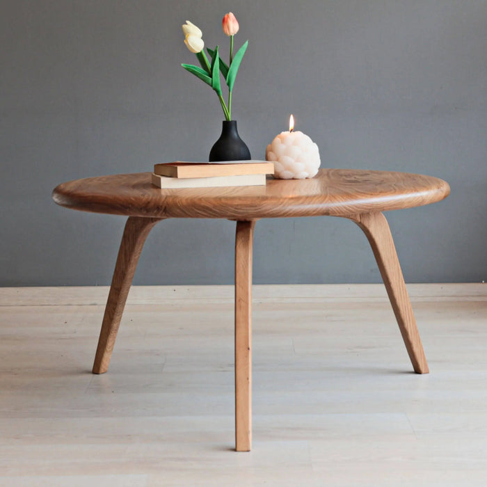 Stylish and durable Aura Solid Oak Wood Coffee Table, featuring a mid-century modern design with tapered legs and natural wood finish