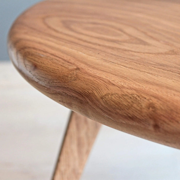 Aura Solid Oak Wood Mid-Century Round Coffee Table with a sleek, polished finish and clean lines, perfect for contemporary living rooms.