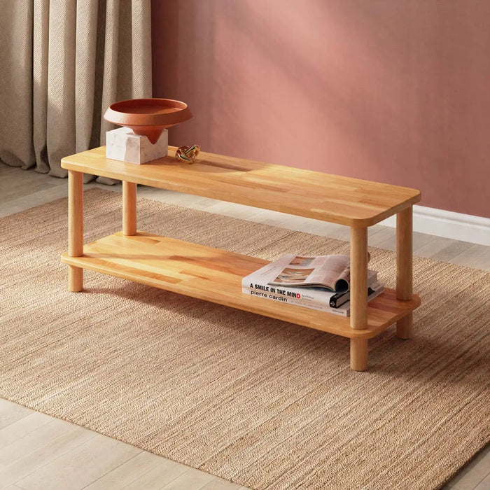 Minimalist Coffee Table with a decor on it and magazine on its shelf