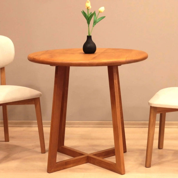 Side view of the Table showing its iconic mid-century wooden legs and round tabletop