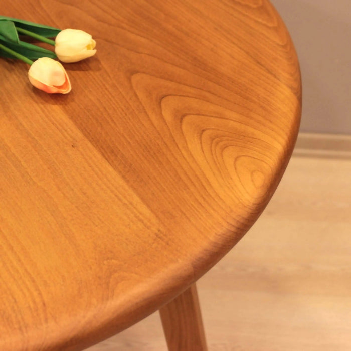 Close-up of the mid-century wooden top design of the Table, crafted from solid beech wood.