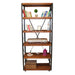 The bookcase in a living room, styled with books, plants, and decorative objects, enhancing the modern-industrial vibe of the space.