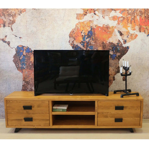 Front view of a solid pine wooden TV stand featuring a spacious design with drawers and open shelves for organized storage.