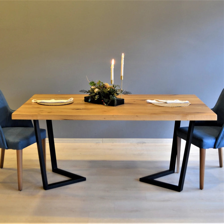 Rustic oak dining table frame with a natural wood grain finish and sturdy construction.