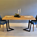 Rustic oak dining table frame with a natural wood grain finish and sturdy construction.