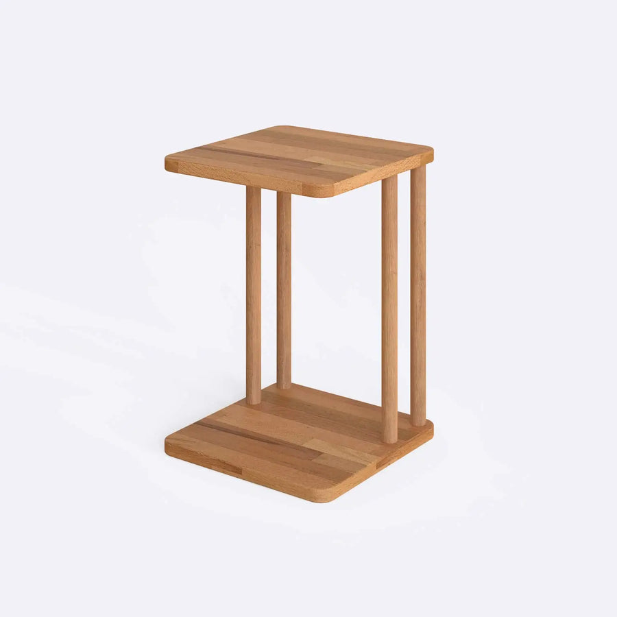 Close-up of the Solid Wood C Table’s craftsmanship – A detailed view showcasing the smooth wood grain and sturdy construction of the C-table.