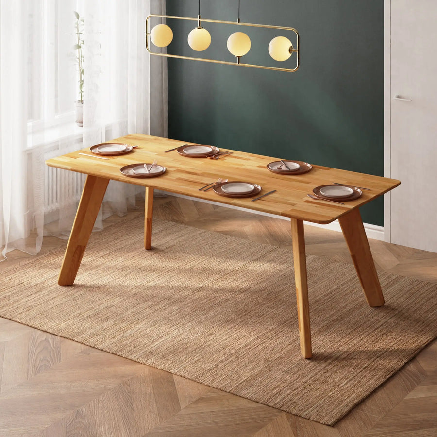 Rectangular dining table made of reclaimed wood, perfect for solid wood dining rooms.