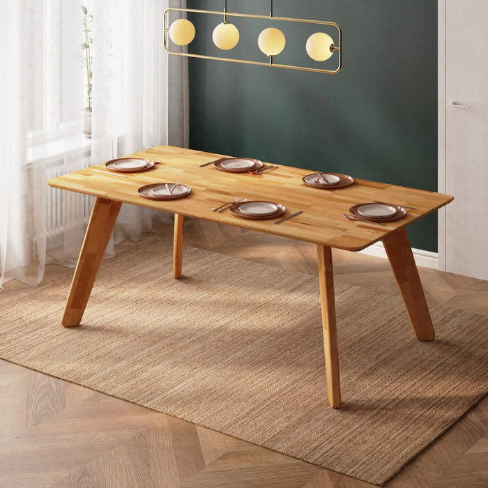 View of the table with natural lighting, highlighting the richness and texture of the wood.