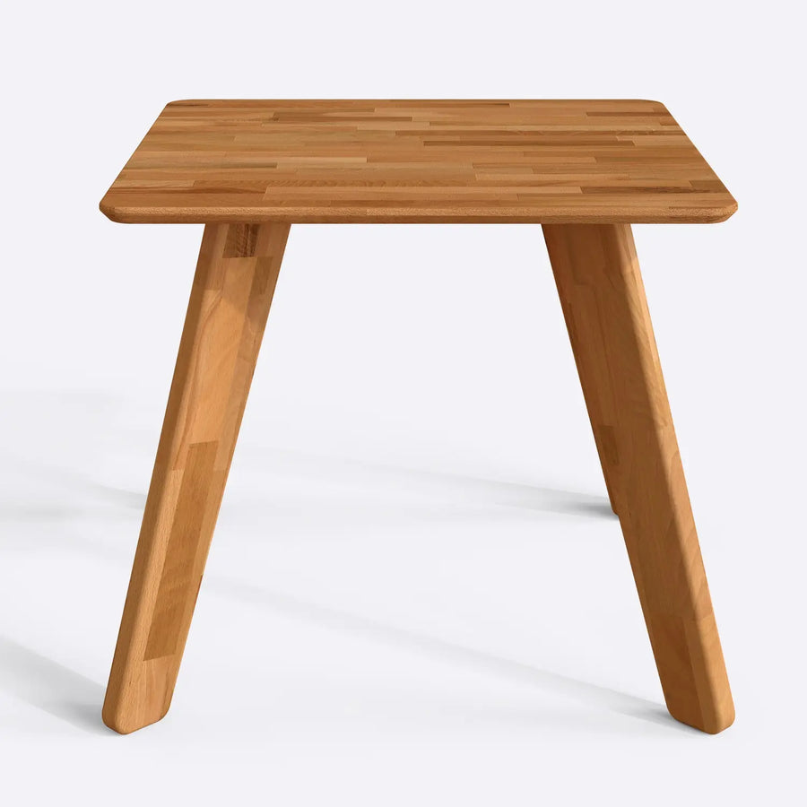 Detailed view of the Dakota table’s smooth beveled edges and precise joinery.