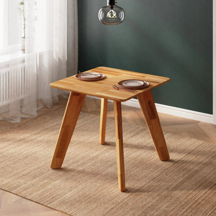 Solid wood construction of the square table, emphasizing durability and elegance.