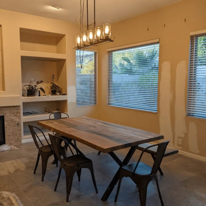 Full view of the table in a minimalist room setup, highlighting its versatility and appeal.