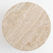 Overhead bird's eye view of Dune Round Travertine Coffee Table tabletop showing natural porous stone texture and wavy beige veining
