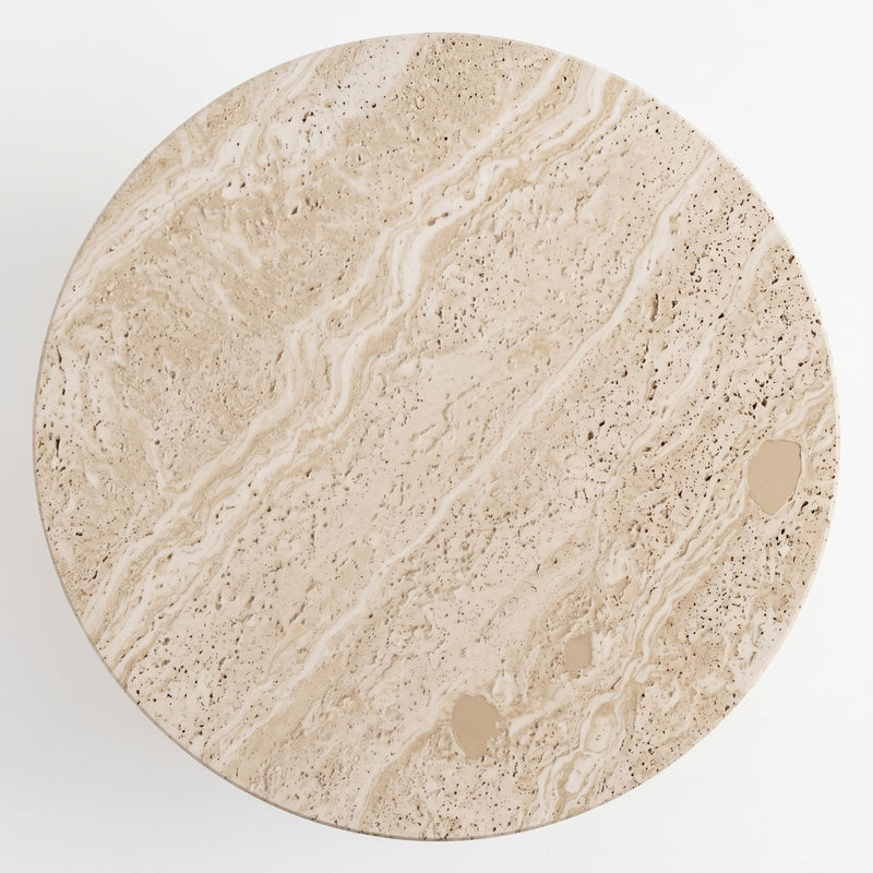 Overhead bird's eye view of Dune Round Travertine Coffee Table tabletop showing natural porous stone texture and wavy beige veining