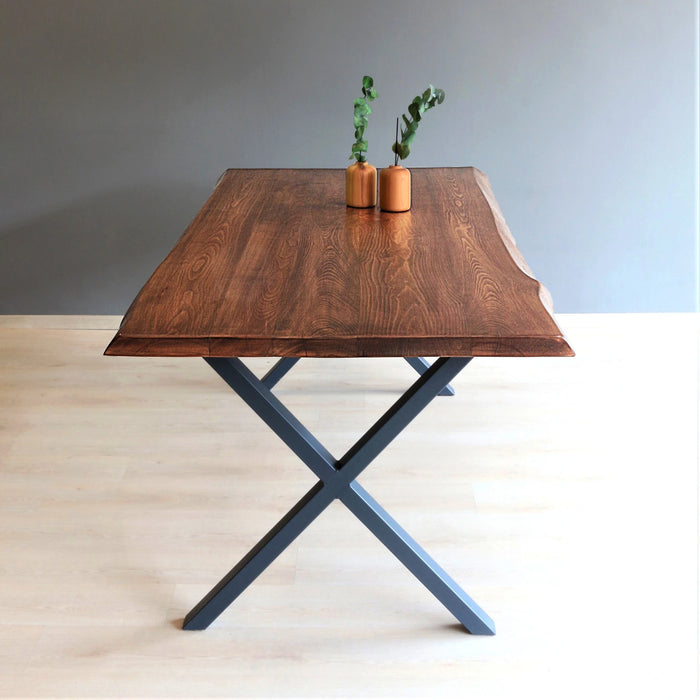 Eagan dining table in a bright room, blending with neutral and wooden tones