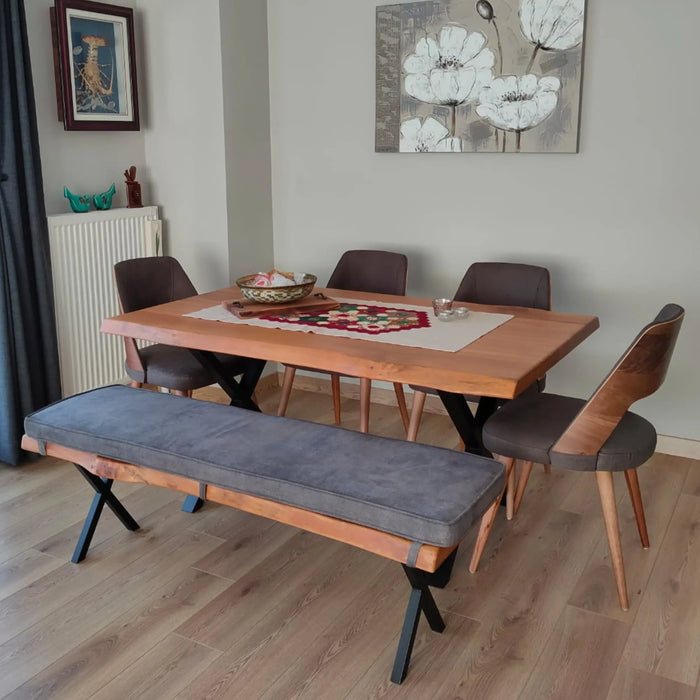 Eagan dining table in a modern dining room, paired with contemporary chairs, showcasing the perfect blend of style and functionality.