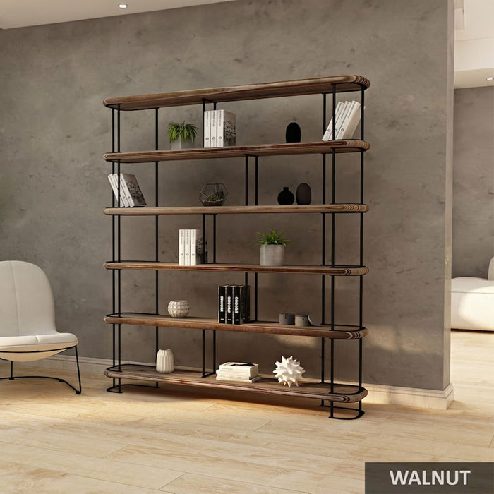 A close-up of the pine wood shelves, showing the smooth finish and natural grain of the wood on the Ellis Mid Century Bookshelf.