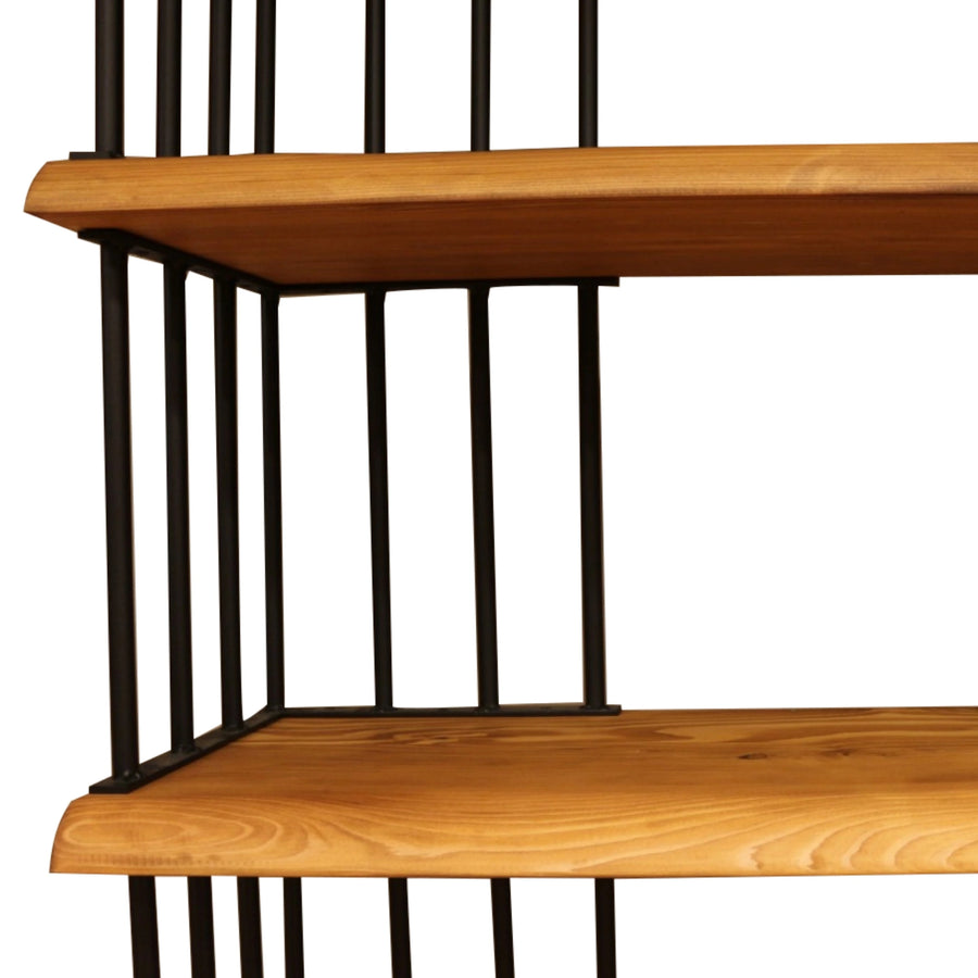 Full-length view of the Fargo Metal Wood Bookcase in a modern living room setting.